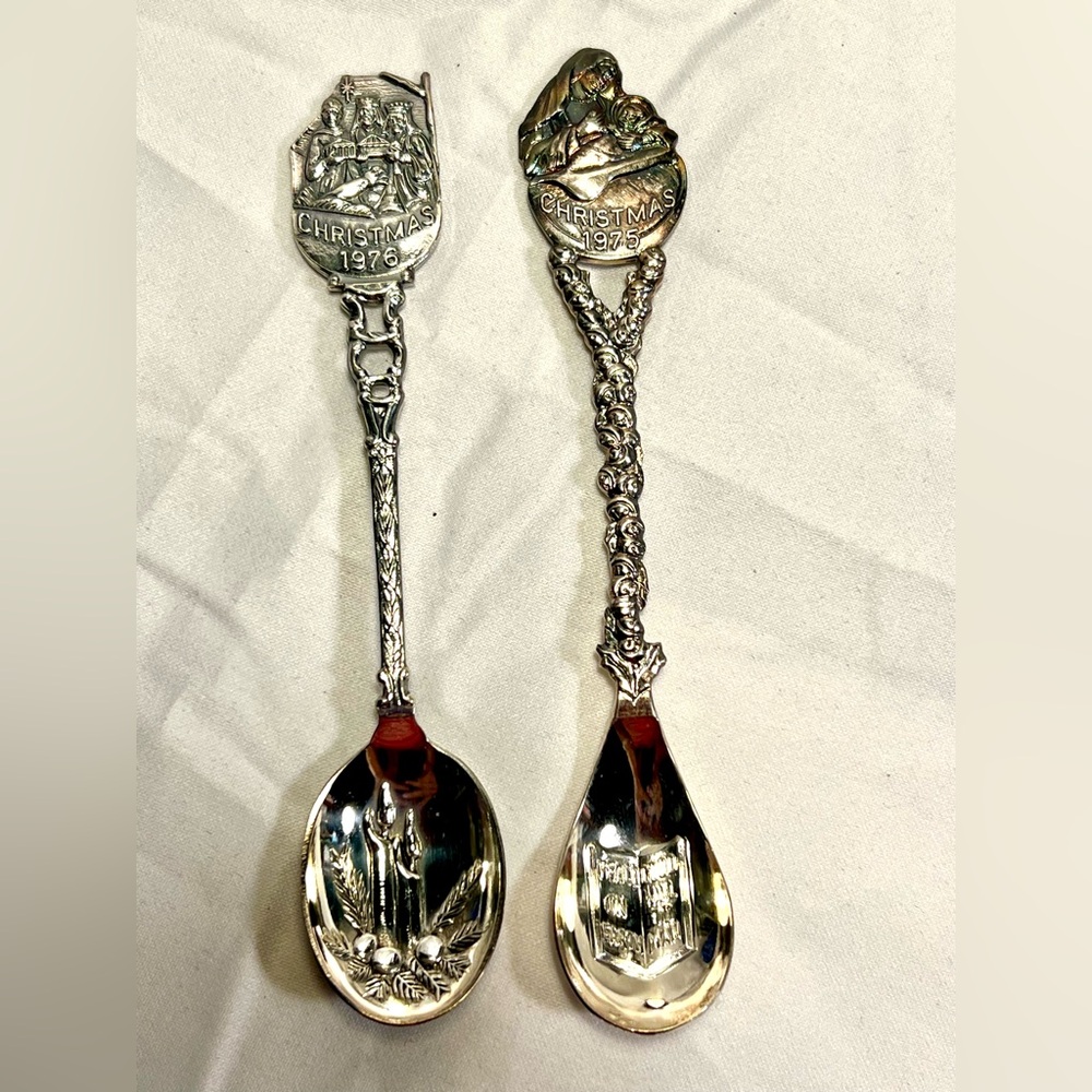 Lot of two 1975 & 1976 Christmas souvenir silver tone spoons, made in Holland